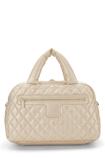 Chanel,  Gold Leather Coco Cocoon Bowling Bag, Gold
