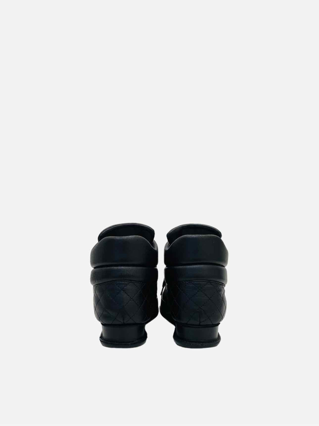 CHANEL High Top Black Quilted Sneakers