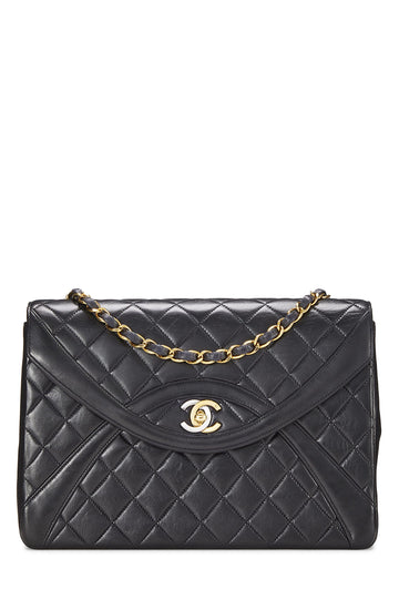 Chanel,  Black Quilted Lambskin Paris Limited Curved Flap Medium , Black