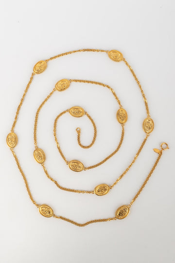 Collier / Sautoir en métal doré Chanel 1980's