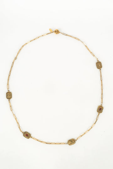 Collier doré Chanel 1984